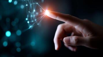 Hand reaching out to touch glowing digital connections in a dark environment, illustrating technology and innovation photo