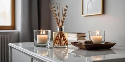 Decorative candle arrangement on a minimalist table in a cozy room with natural light streaming in photo