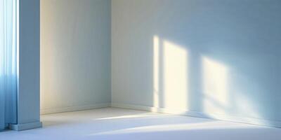 Bright sunlight casts soft shadows in a minimalistic room with blue walls and white floors photo