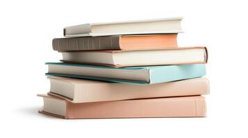 Stacked books in various colors and sizes displayed on a white background showcasing literary diversity and potential for learning photo