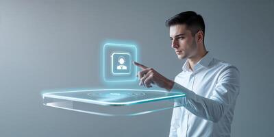 Young man interacts with futuristic holographic interface in a modern setting during daytime photo