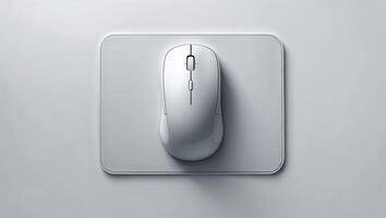 Wireless mouse on a sleek mouse pad against a minimalistic background photo