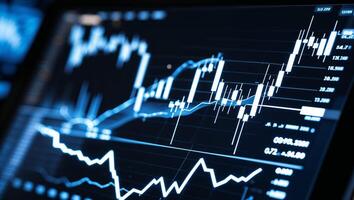 Financial data analysis on a digital display showcasing stock trends and price changes in real-time photo