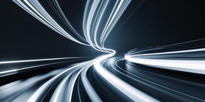 Bright light trails create an abstract pathway in a dark environment at night, suggesting speed and motion photo
