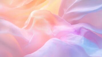 Soft pastel fabric waves creating an ethereal texture in gentle light photo