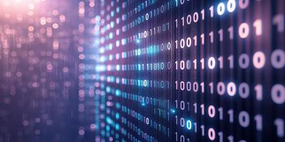 Digital binary code streams lighting up a dark background during a tech-themed event at night photo
