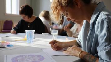 Participants engage in an art workshop focusing on intricate pattern drawing in a bright and welcoming studio photo