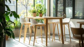 Sunny interior with modern wooden table and chairs in a cozy dining environment during daytime photo