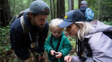 Exploring nature with a child in a lush forest during a guided educational hike focusing on wildlife and plant identification photo