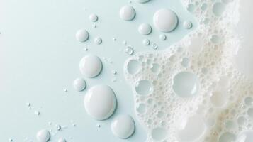 Delicate bubbles and droplets gather on a soft surface in a serene light-filled setting photo