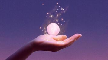 Magical orb floating above an outstretched hand at dusk with sparkling effects in the background photo