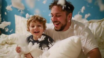 Playful father and son enjoying a pillow fight in a cozy bedroom at home during an afternoon of fun and laughter photo