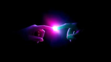 Light touches create a connection between two hands in a darkened space during a dramatic moment of interaction photo