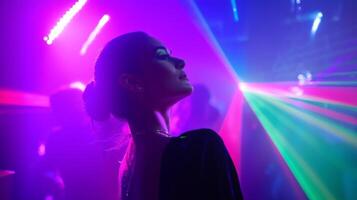 Bright lights and vibrant colors create an energetic atmosphere during nightlife at a club event photo