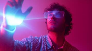 Young person using futuristic glasses in a colorful light display photo
