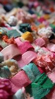 Colorful textile art showcases intricate weaving techniques with vibrant fabric strips on display in a local craft studio photo