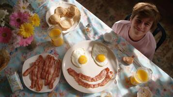 Creative breakfast with smiling eggs and crispy bacon enjoyed by a happy child at a sunny kitchen table photo