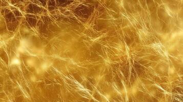 Golden abstract texture with shimmering lines resembling strands of light in a warm glow photo