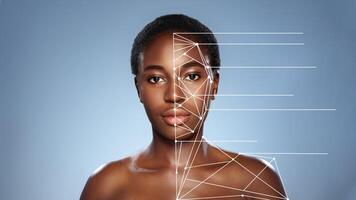 Face analysis showcasing digital overlay on a model's facial features in a studio setting photo