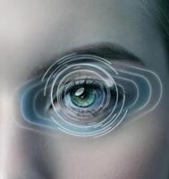 Visual representation of digital eye enhancement with swirling light patterns and a close-up of an eye in focus photo