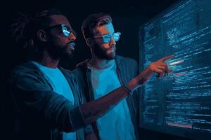 Two individuals analyzing code on a glowing screen in a dark room during a tech-focused brainstorming session photo