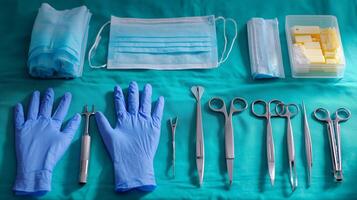 Surgical tools and protective equipment neatly arranged on a green surgical table for a medical procedure in a hospital setting photo