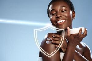 Skincare routine featuring a smiling woman applying lotion with radiant blue background photo