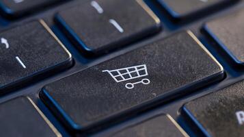 A close up of a shopping cart on a keyboard photo