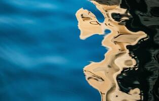 Serene water surface reflecting sky and city form photo
