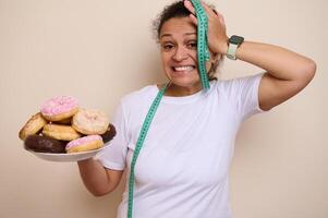 A Woman Chooses Between Sweet Doughnuts and Healthy Fruits for Wellness photo