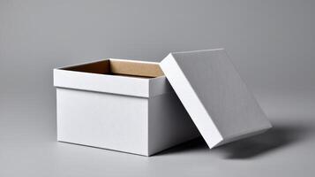 Simple white box with an open lid showcasing its interior on a neutral background photo