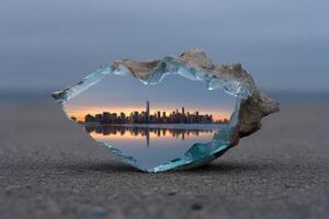 Rearranged mirror reflection forms a unique skyline at dusk photo