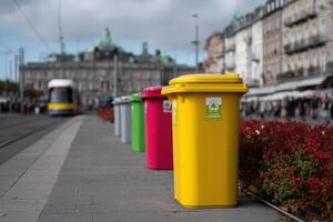 Clean recycling station with colorful bins in Berlin on a clear day photo
