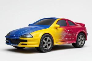 Toy car with scratches on surface showcasing vibrant colors and unique design photo