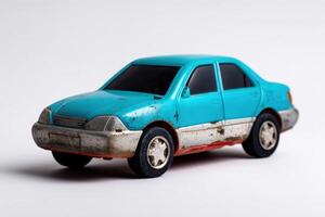Toy car with scratches on surface displaying wear and tear from playful adventures photo