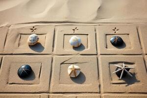 Creative beach design with seashells arranged in a grid pattern on the sand photo