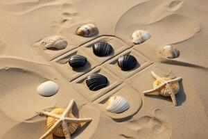 Noughts and crosses design in sand with seashells on beach photo
