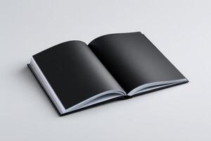 Open book with blank black pages ready for creative expression and note-taking photo