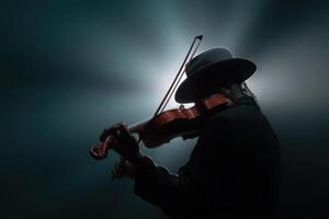 Violinist performs passionately in dramatic lighting during evening concert photo