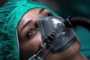 Patient receiving medical care while wearing an oxygen mask in a healthcare setting photo