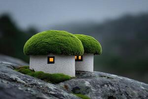 Mushroom-shaped homes nestled in lush moss on rocky terrain during twilight photo
