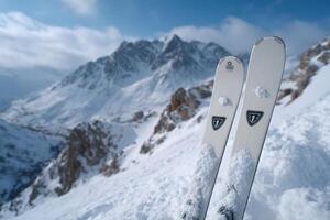 Luxury advertisement showcasing a pair of designer skis set against a snowy mountain backdrop photo