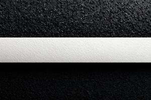 Clean flat white line on textured dark surface creates minimalist aesthetic appeal photo