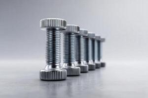 Steel bolts arranged in a perfect row showcasing precision in engineering design photo