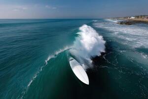 Surfer skillfully navigating a powerful wave in bright daylight near the shore photo