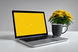 Laptop on a white table displaying AI interface with a coffee cup and plant nearby photo