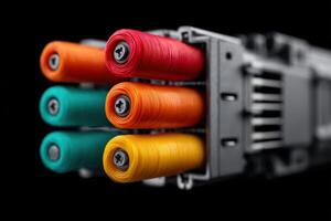 Cross-connect system featuring vibrant fiber spools in a dark setting photo