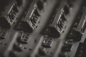 Angled patch panel connectors arranged in close proximity on a structured surface photo