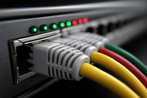 Patch cords connected to network equipment in a well-lit room with indicator lights active photo