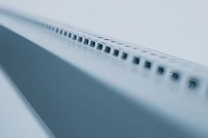 Close-up view of a single row patch panel showing numerous connection ports and details photo